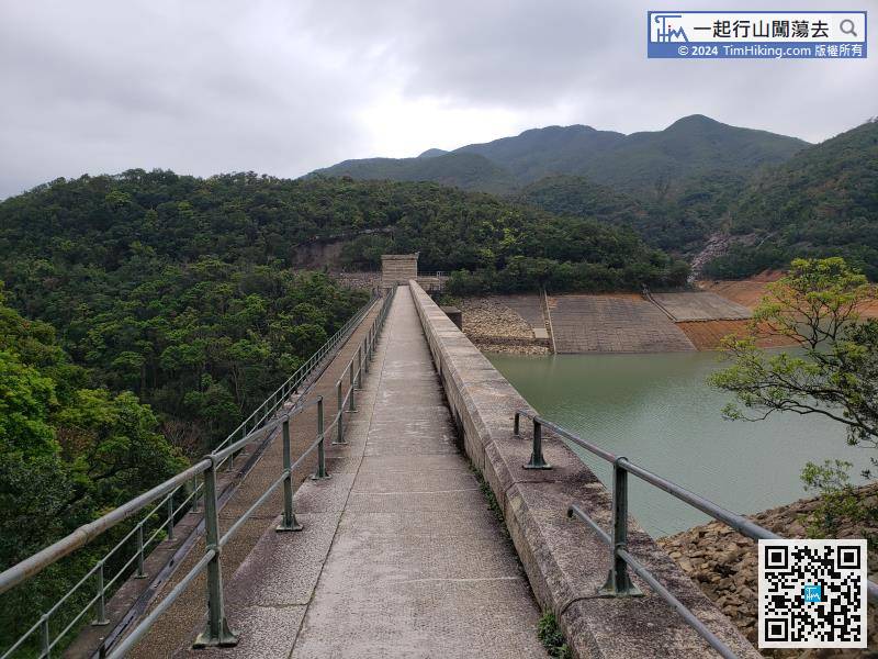 Across the Tai Tam Upper Reservoir Dam,