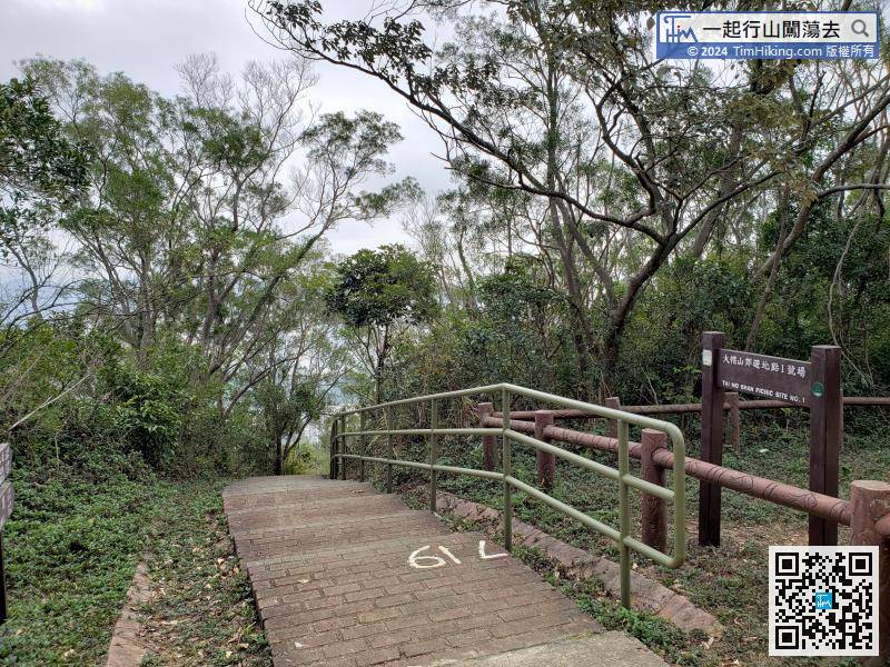 There are stairs on the left that leads to the catchwater and Lo Wai, and there are 719 steps engraved on the ground.