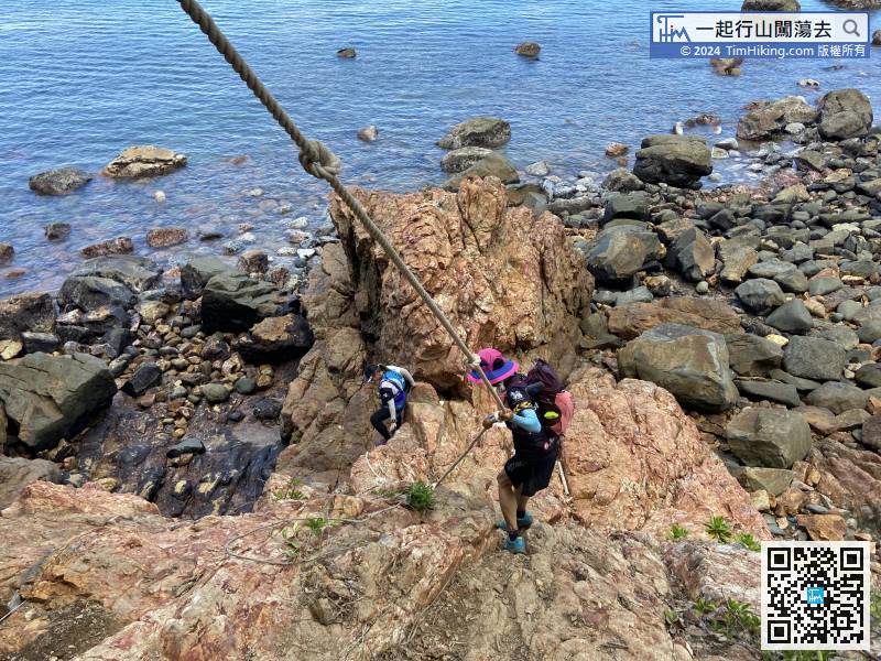 The last step to the shore is required to climb down a rock wall,