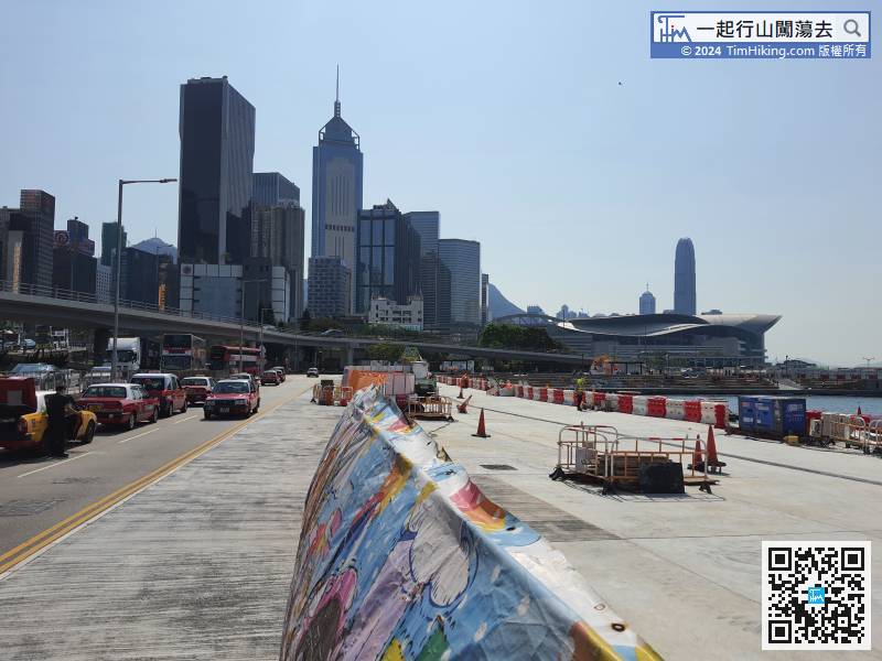 Walk along Hung Hing Road and come to the waterfront park under construction.